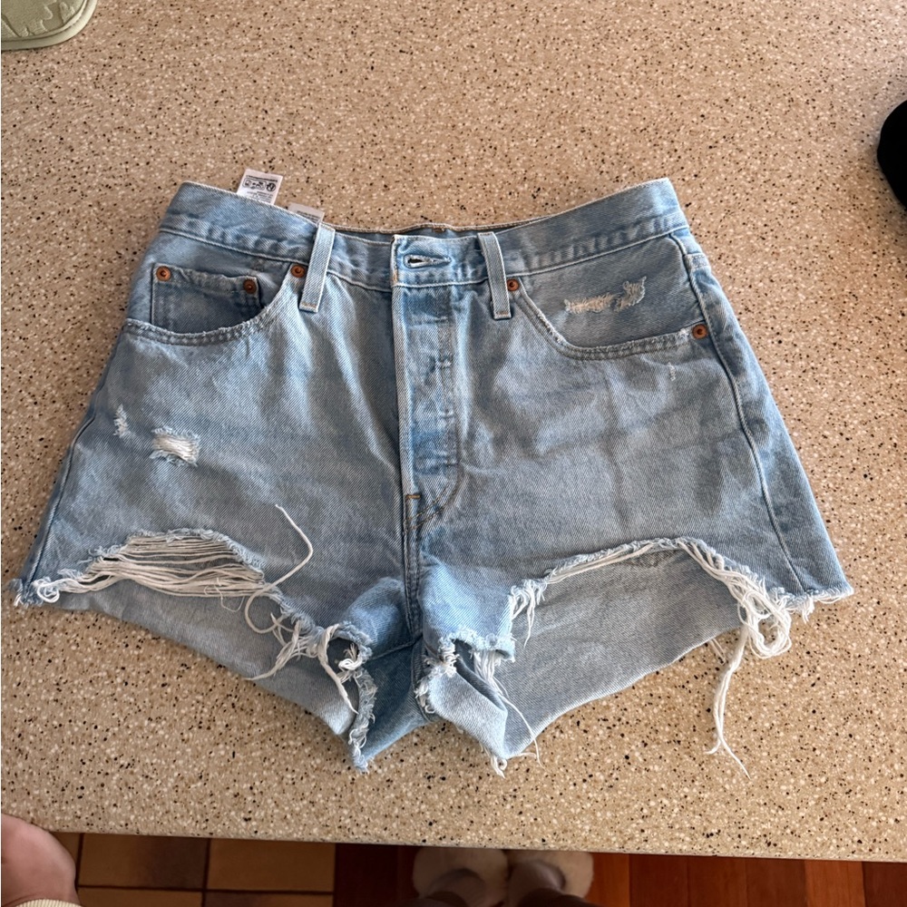 Levi’s Light Blue Distressed Denim Shorts